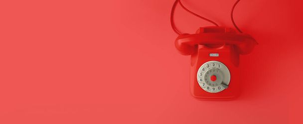 Ένα κόκκινο vintage τηλέφωνο κλήσης. - Φωτογραφία, εικόνα