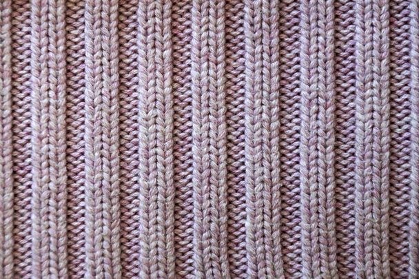 roze gladde gebreide textuur voor textiel achtergrond - Foto, afbeelding