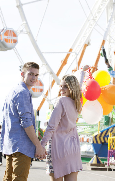 Couple in an amusement park - Photo, Image