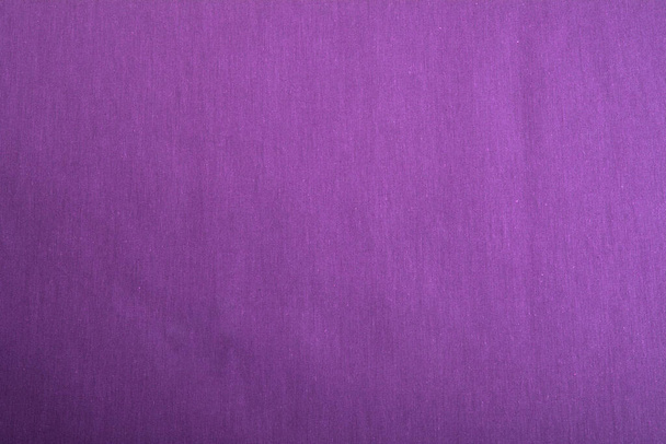 Vista frontal de tecido natural de algodão roxo, pode ser usado como fundo para trabalhos de design. Vista frontal. Para costurar roupas e camisa. Espaço para texto. - Foto, Imagem