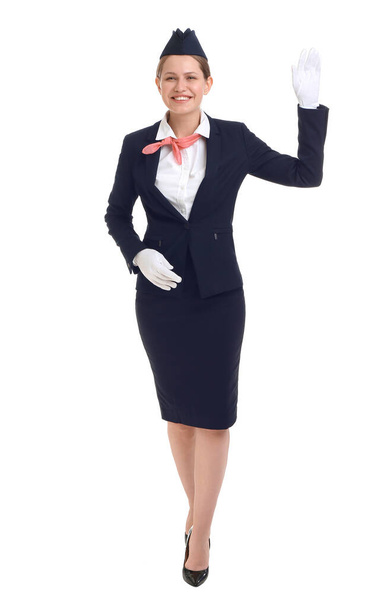 Beautiful stewardess on white background - Foto, immagini