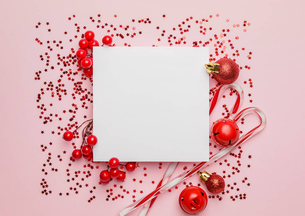 Beautiful Christmas composition with blank card on color background - 写真・画像