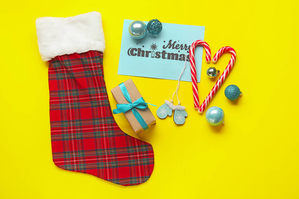 Composition with Christmas sock on color background - Fotografie, Obrázek
