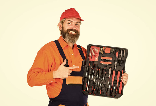Handyman concept. Screwdrivers set. Man carries toolbox white background. Worker repairman handyman carrying toolbox. Electrician tools. Furniture makers design and craft individual pieces furniture - Φωτογραφία, εικόνα