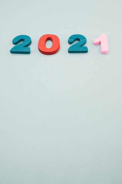 The colorful wooden numbers 2021 on white background. New year concept - Foto, Bild
