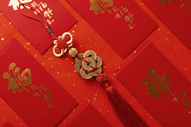 A top view shot of Chinese decorations and lucky charms - concept of Chinese New Year - Φωτογραφία, εικόνα
