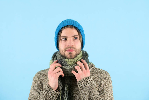 Winter is coming. Man wear winter clothes in cold weather. Bearded man got cold and flu. Cold nose, warm heart - 写真・画像
