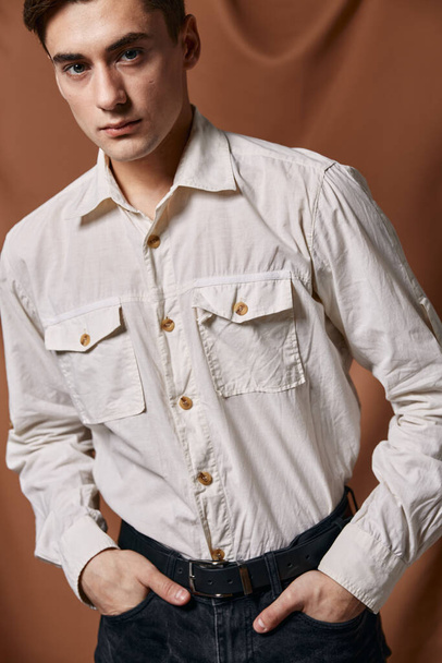 Handsome man in shirt close-up studio fabric background - Foto, immagini