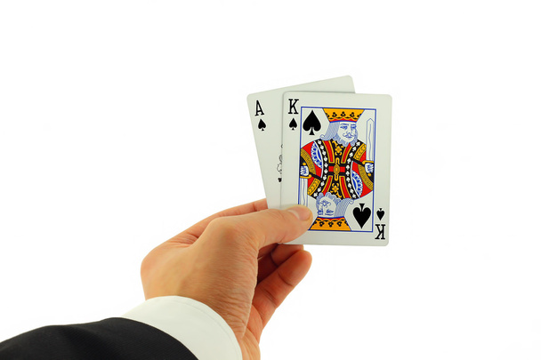 Mano della carta di blackjack isolata su bianco
 - Foto, immagini