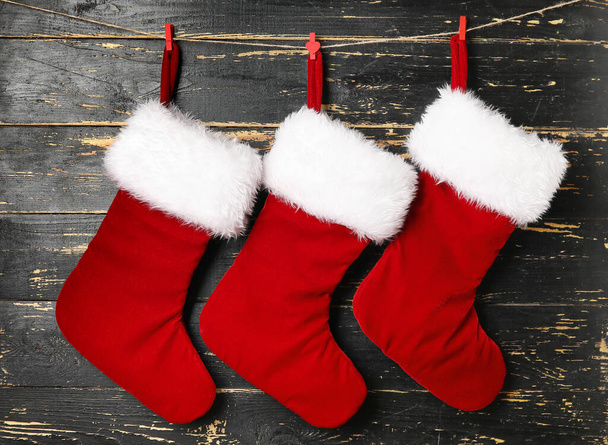 Christmas socks on dark wooden background - Photo, Image