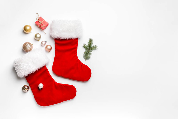 Composition with Christmas socks on white background - Photo, Image