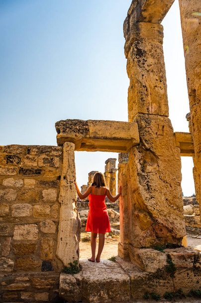 Girl in Hierapolis ancient city ruins Pamukkale Turkey UNESCO world heritage - 写真・画像