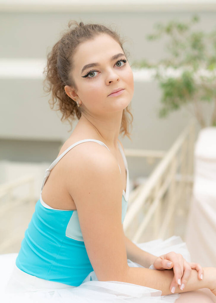 Beautiful flexible slender young girl ballerina. Ballet - Fotó, kép