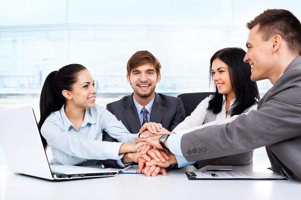 Business people holding pile of hands - Photo, Image