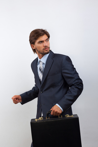 Businessman with briefcase - Фото, зображення
