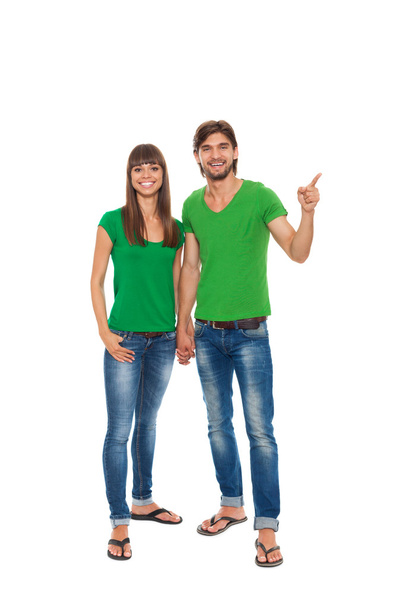 Couple in green t-shirts - 写真・画像