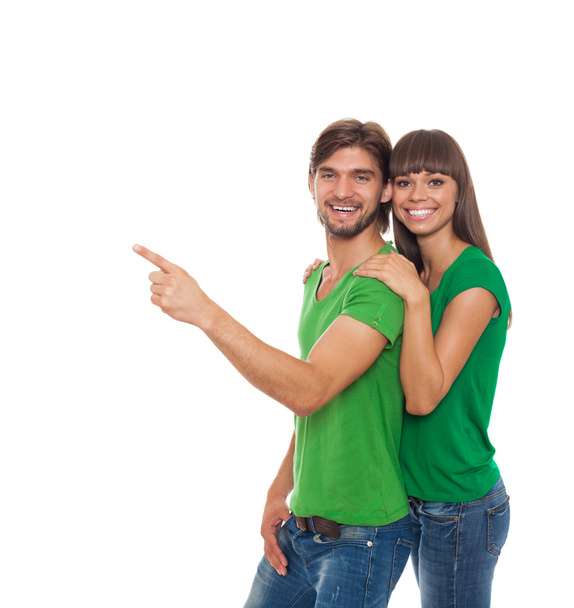 Couple in green t-shirts - Foto, afbeelding