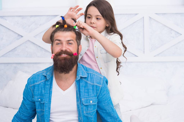 Adorable small daughter child style bearded man fathers hair, haircare - Photo, image