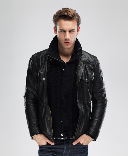 Serious man wearing leather jacket - Фото, изображение