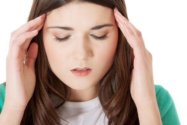 Young casual woman is having headache. - Photo, Image