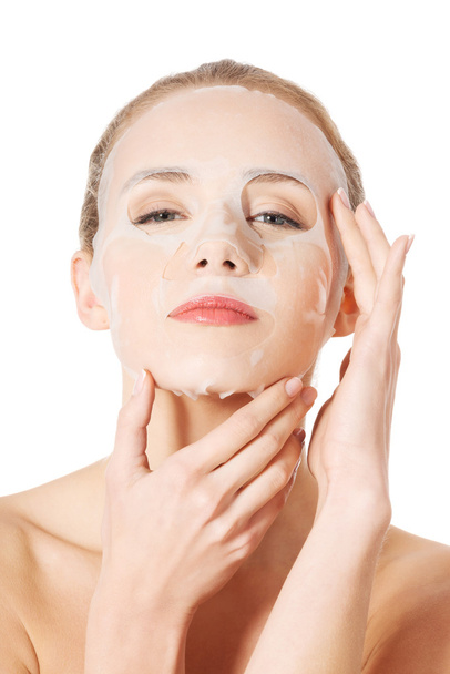 Beautiful woman with collagen mask on face. - Foto, imagen