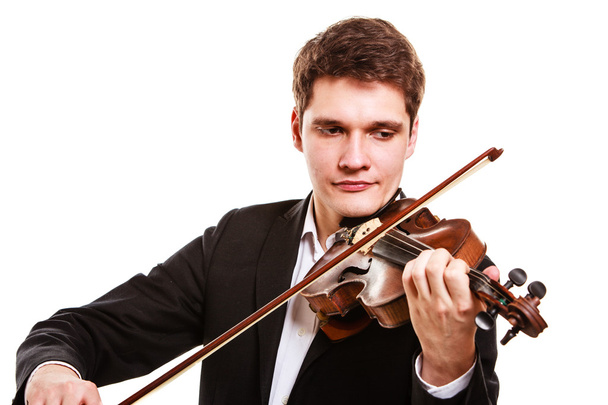 Man violinist playing violin. Classical music art - Fotografie, Obrázek