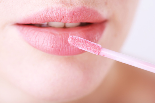 Beautiful make up of glamour pink gloss lips, close up - Foto, Bild