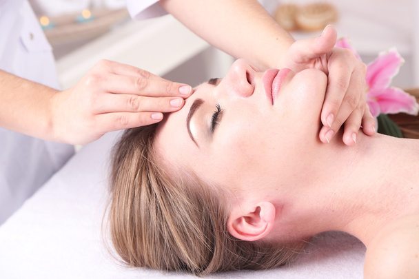 Beautiful young woman having head massage in spa salon, close-up - Fotoğraf, Görsel