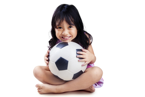 Little girl with soccer ball - Foto, Imagen