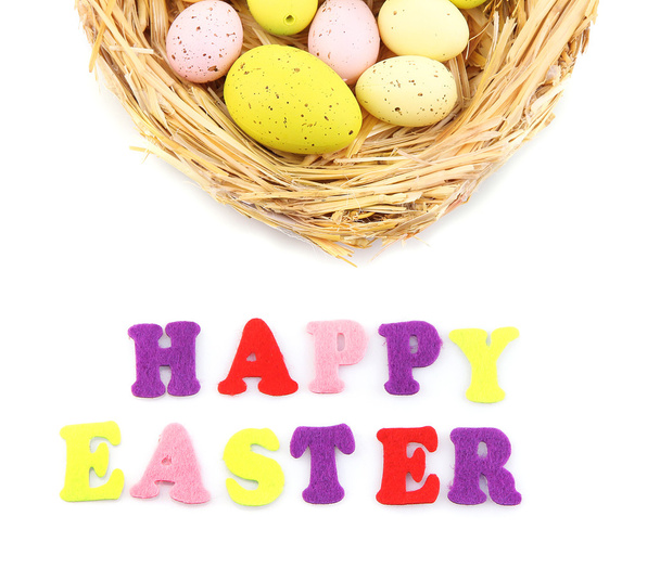 Easter eggs in nest and Happy Easter sign, isolated on white - Φωτογραφία, εικόνα