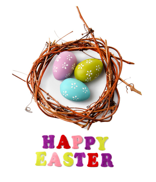 Easter eggs in wreath isolated on white - Φωτογραφία, εικόνα