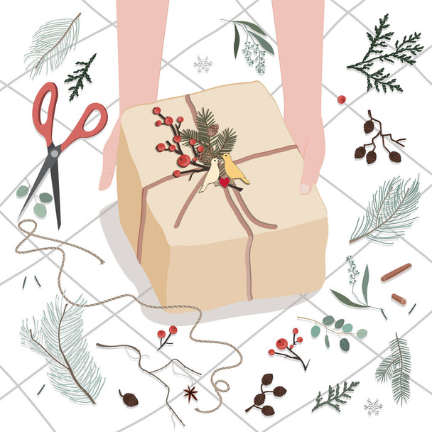 Lidské ruce zdobí dárkovou krabici nebo balíček zabalený do hnědého dopisního papíru s jedlovou svačinou a odznakem ptačího páru. Vektorová ilustrace pro Vánoce, svátky, dárky, Nový rok a lidé koncept - Vektor, obrázek