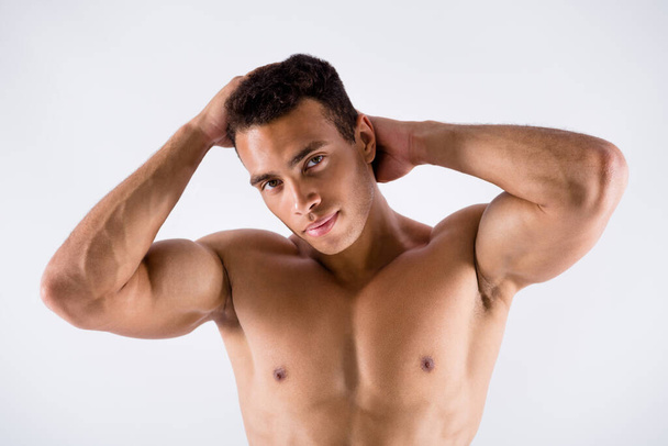 Close-up portrait of his he nice attractive groomed perfect sportive guy powerlifting touching hairdo washing shower bath gel lotion shampoo isolated on light white pastel color background - Foto, Imagen