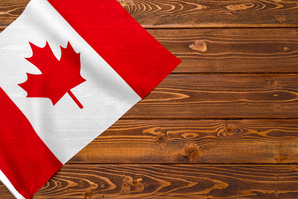 Flag of Canada on wooden background, copy space - Zdjęcie, obraz