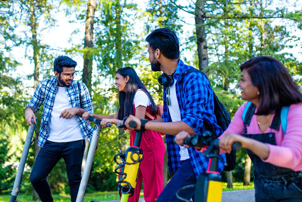 modern indian friends ride on segway in park in India - Photo, Image