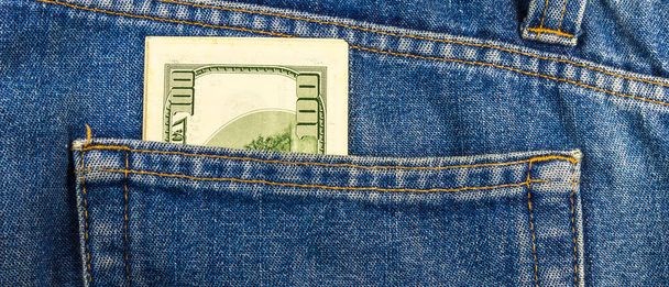 A panoramic shot of money bills in a pocket - Fotó, kép