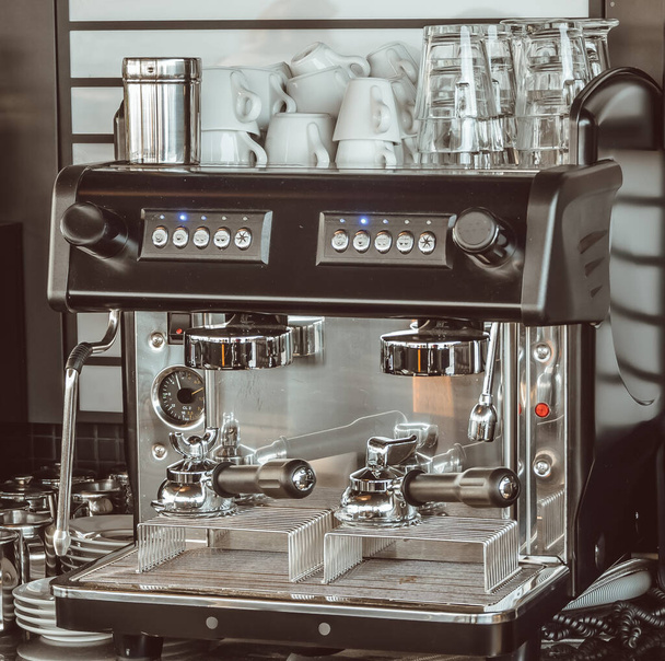 The picture shows a view of a professional coffee machine in a restaurant - Foto, immagini