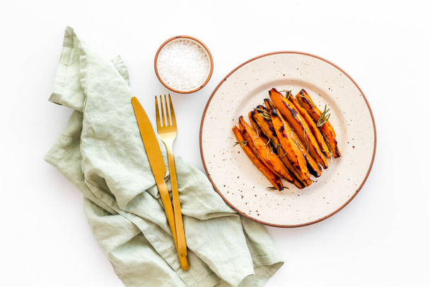 Top view of sweet potato fries with herbs and spices - Foto, Imagen