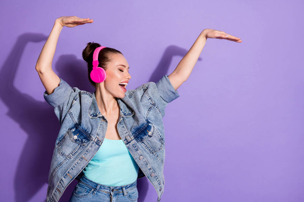 Portrait of nice attractive lovely pretty dreamy cheerful cheery glad positive girl listening pop hit sound having fun dancing isolated bright vivid shine vibrant lilac purple violet color background - 写真・画像