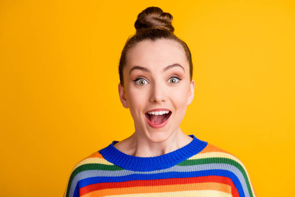 Portrait of astonished positive cheerful girl look good wonderful bargain impressed scream wear sweater isolated over shine color background - Fotografie, Obrázek