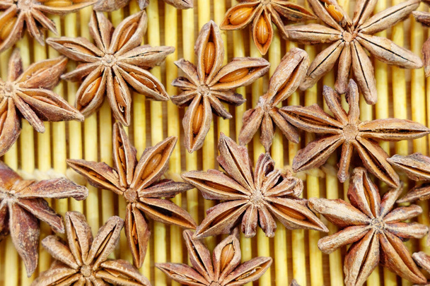 Anise star seeds. Aromatic ingredient in culinary, raw for alcohol drink arak, ouzo, raki, sambuca. - Фото, зображення