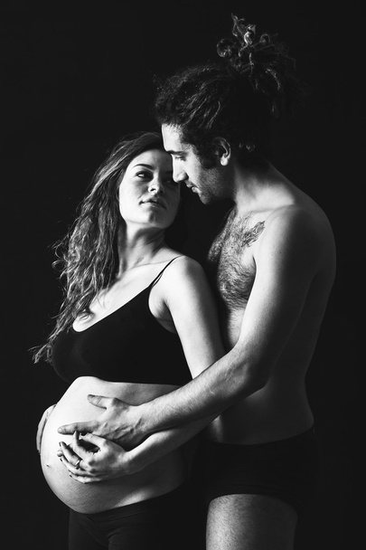 Pregnant Woman with her Housband - Valokuva, kuva