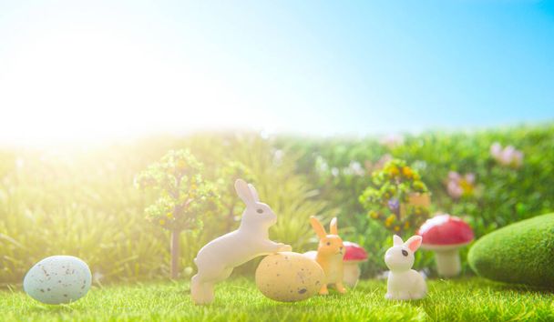Easter rabbits toy on spring green grass. Fairy tale. - Fotoğraf, Görsel