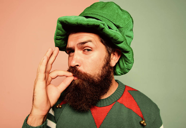 Just perfect. Christmas elf. Elf concept. Happy celebration. Bearded elf. Winter carnival. St Patricks day. Hipster with beard wearing green party costume excellent. Cheerful man celebrate holiday - Valokuva, kuva
