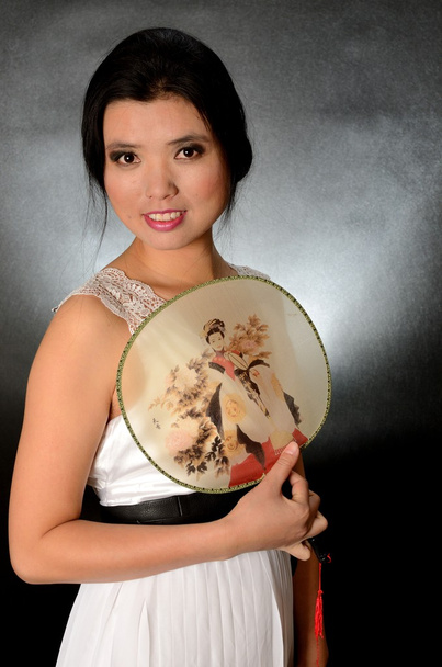 Chinese lady with fan - Photo, Image