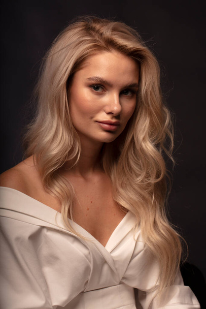 Blonde hair female model posing on camera  - Fotografie, Obrázek