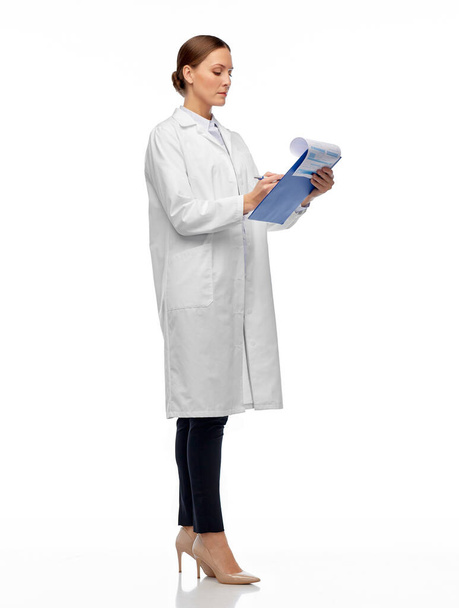 female doctor or scientist with clipboard - Foto, Imagem
