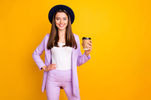 Portrait of her she nice-looking attractive winsome pretty fashionable lovely cheerful cheery teen girl drinking aromatic fresh espresso isolated on bright vivid shine vibrant yellow color background - Valokuva, kuva