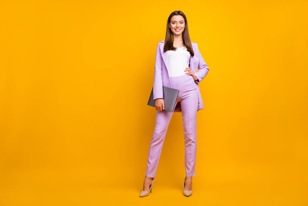 Full size photo of beautiful business ceo lady holding notebook hands ready for corporate conference wear stylish purple office costume isolated yellow color background - Valokuva, kuva