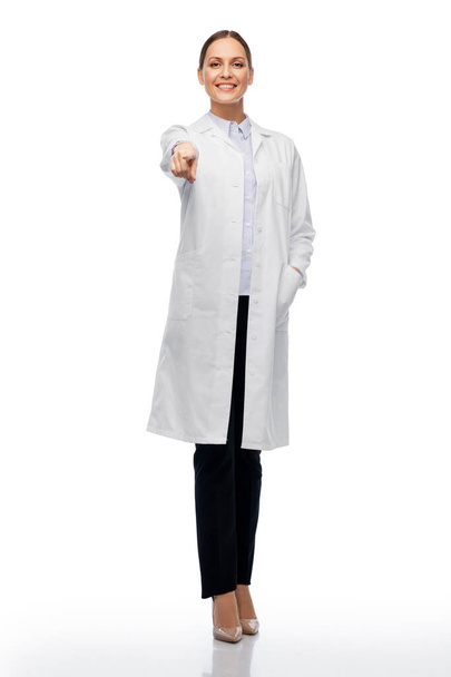 happy female doctor or scientist pointing to you - Fotoğraf, Görsel